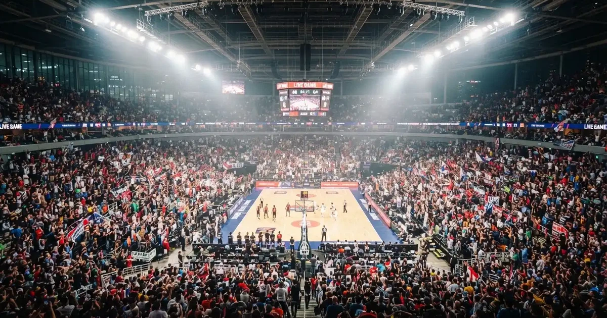Un pabellón deportivo lleno bajo los focos, fotografiado desde muy lejos